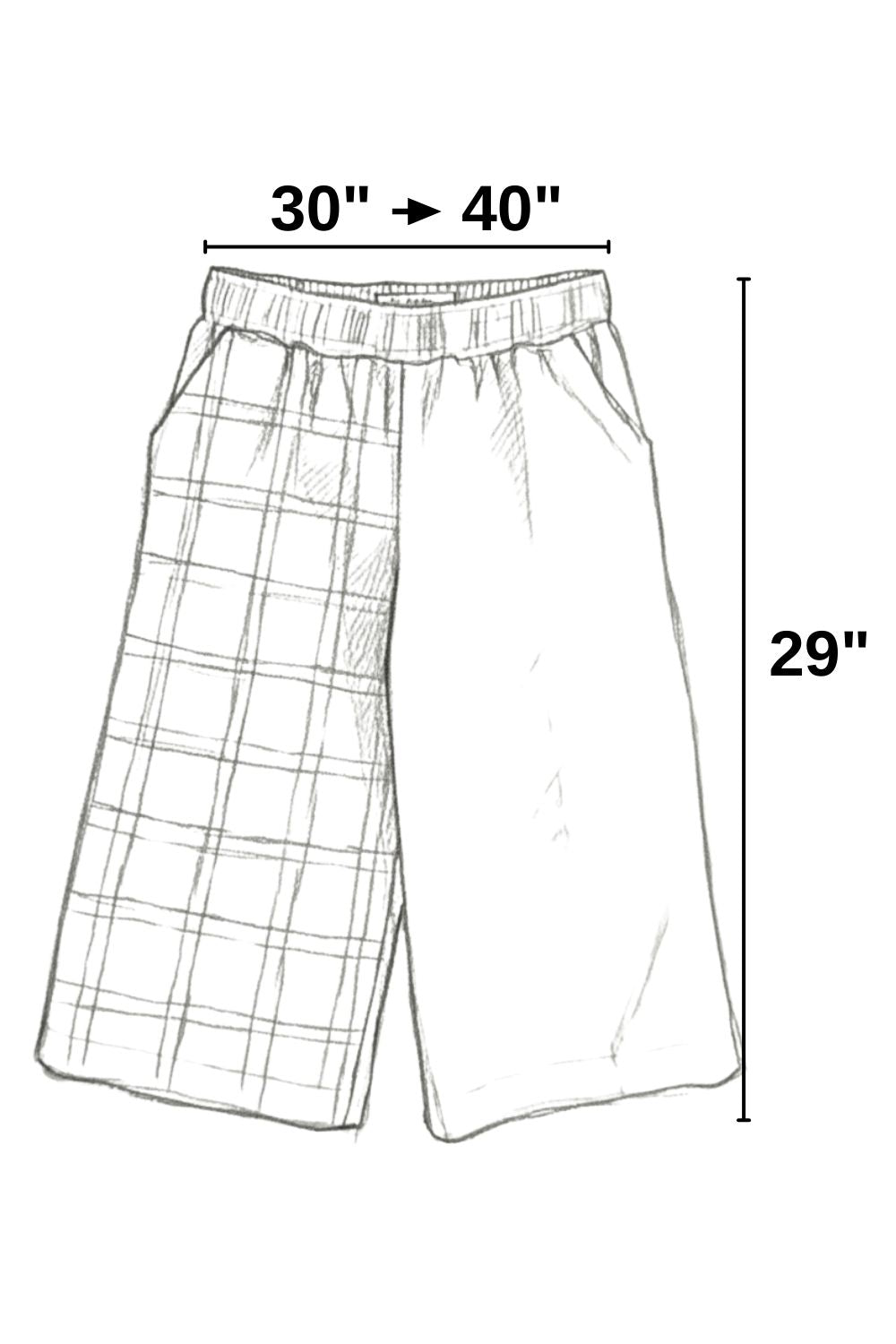 Boceto del diseño del pantalón Nexo, incluyendo sus medidas y lo que estira el elástico.